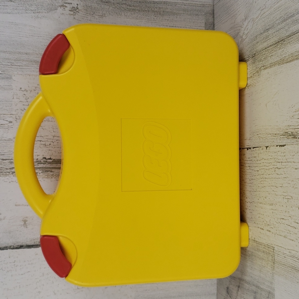 Lego carrying case with an assortment of Legos